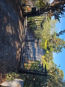 Ornamental iron swing gate repair Los Angeles hillside property