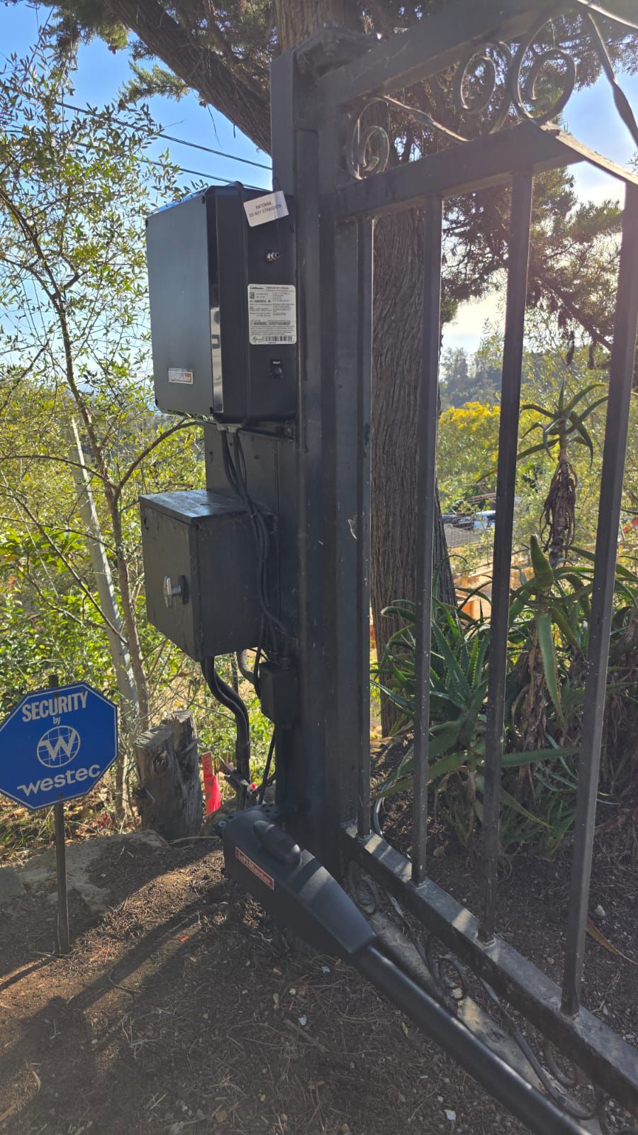 Swing gate actuator control box hillside property Los Angeles CA