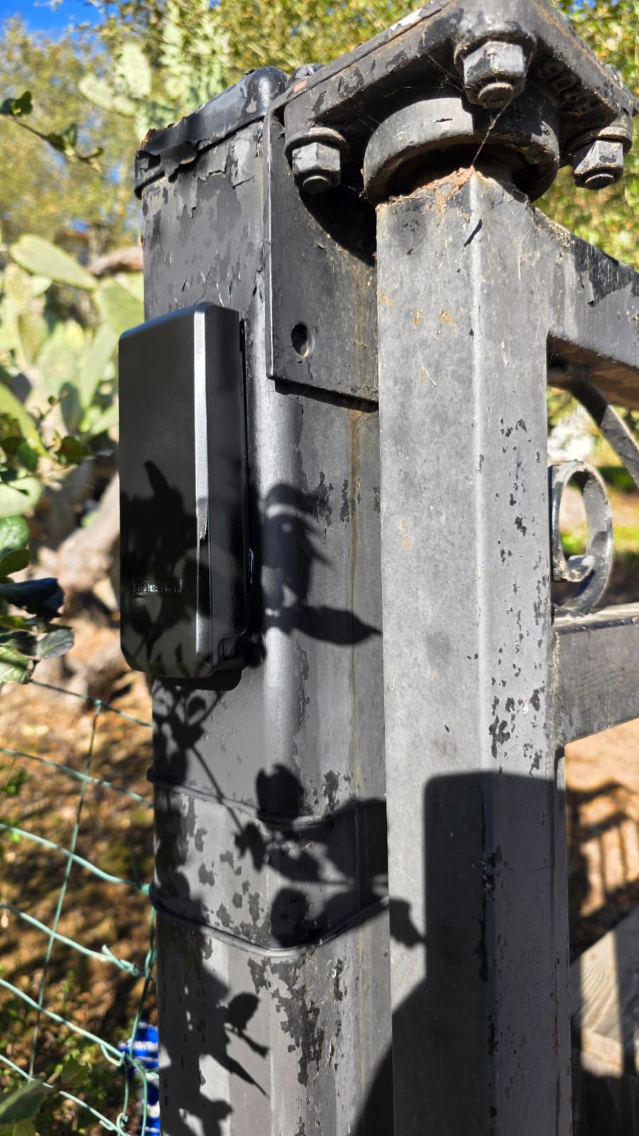 LiftMaster sensor installed on old iron gate Los Angeles