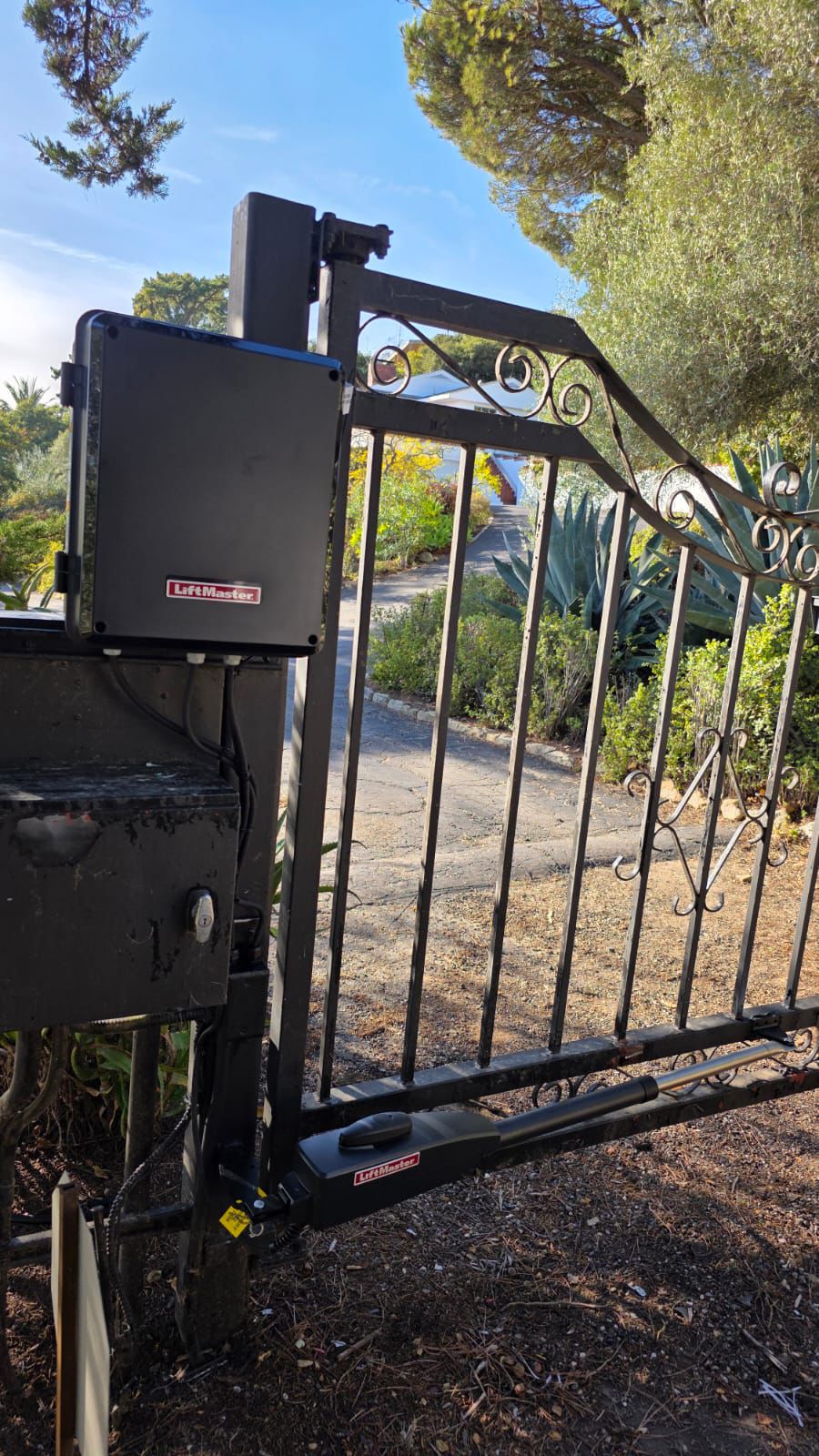 LiftMaster control box and actuator on ornamental iron gate Los Angeles
