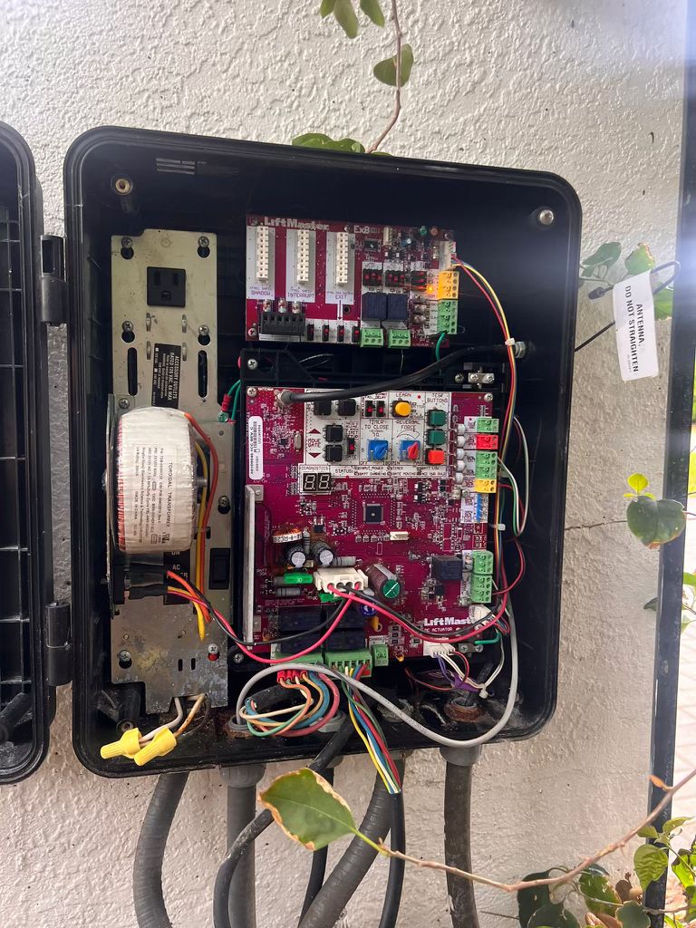 Swing gate actuator arm installation California